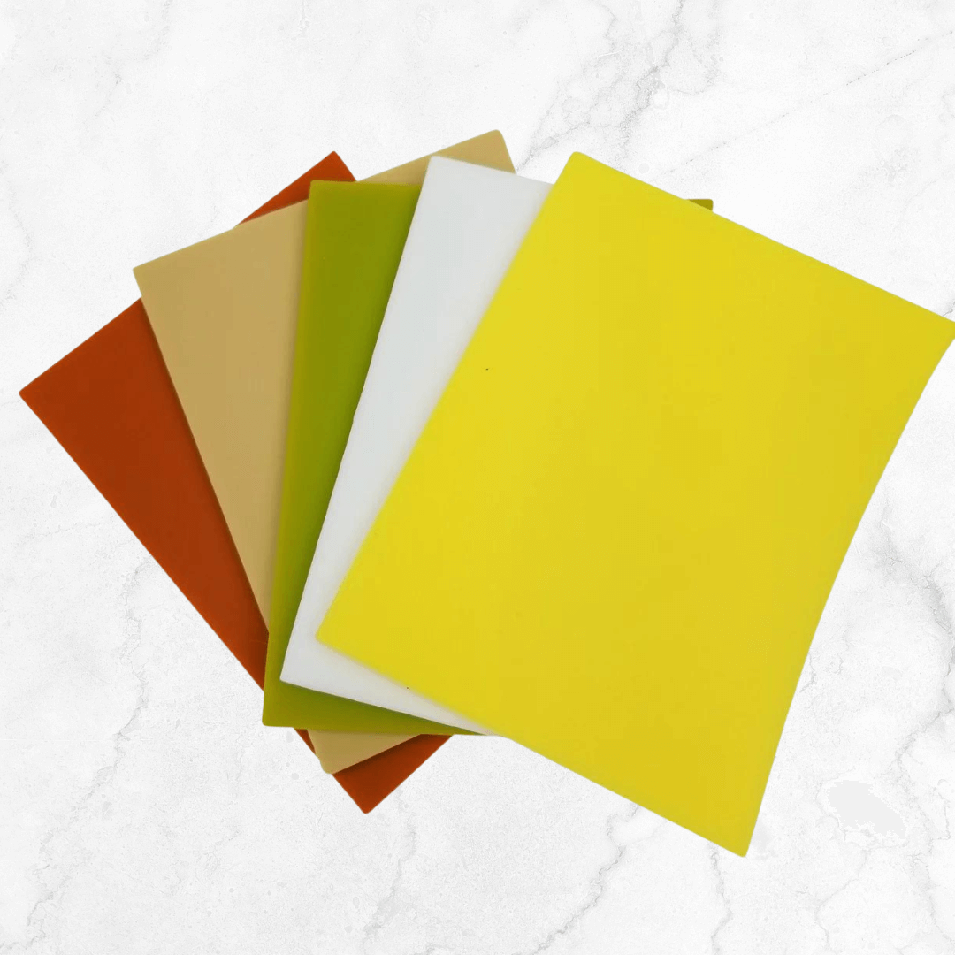 Colorful Cheese Vault Dividers in various shades including yellow, green, orange, beige, and white on a marble background.