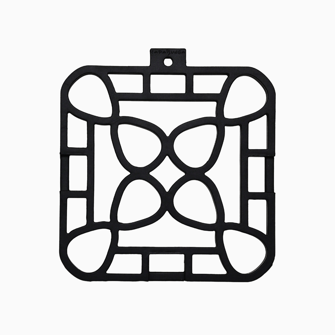 Interlocking silicone trivet with a unique modular design for heat-resistant protection and stylish serving.