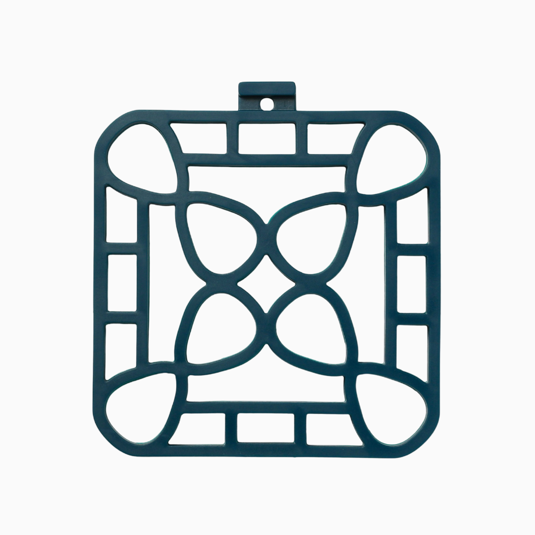 interlocking silicone trivet in blue with a unique design for heat-resistant protection and serving.
