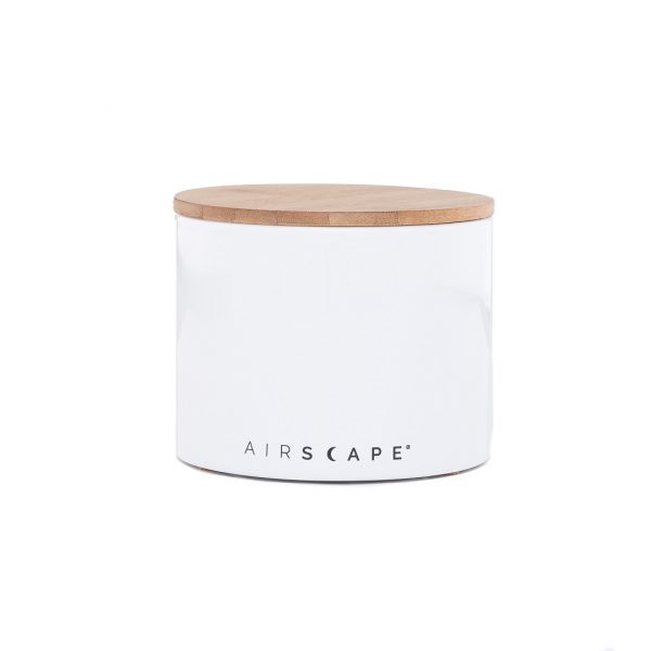 Photo of a white airscape ceramic coffee storage container.