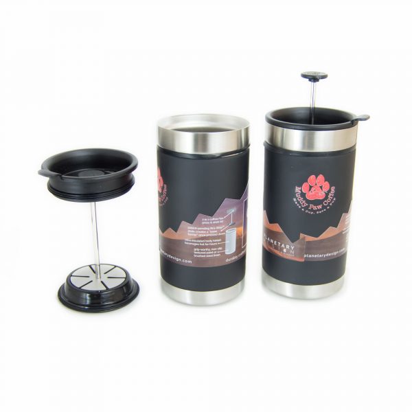 Photo of two travel coffee presses. There is landscpe images on both sides of the mug along with a logo of a paw and small writing.