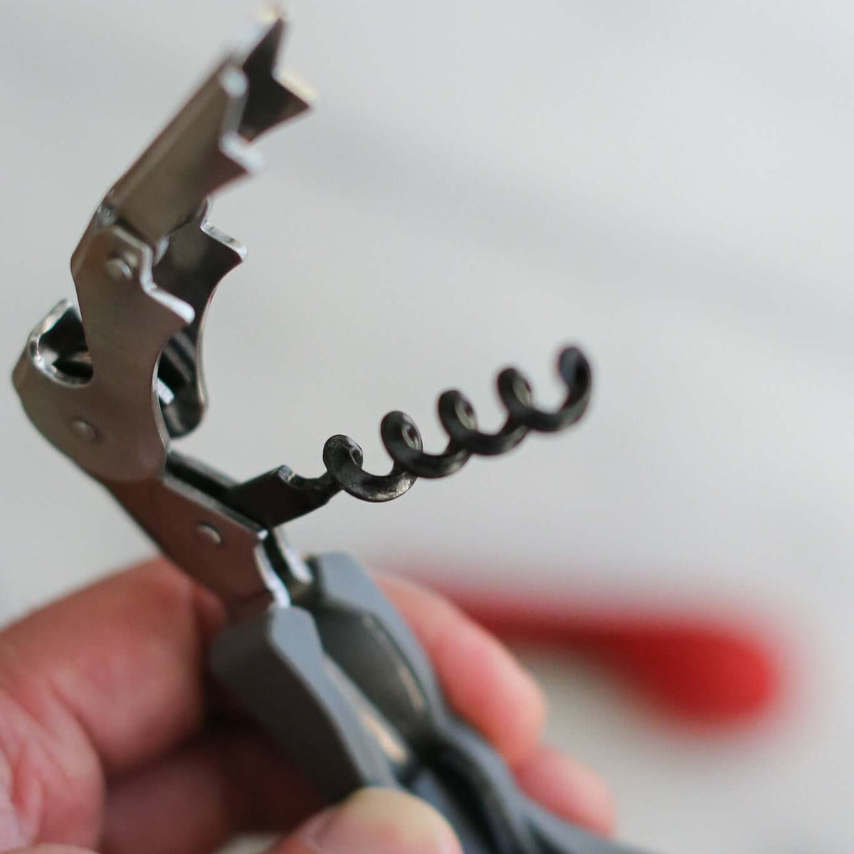 Close-up of Silicone Handled Corkscrew by CapaBunga, showcasing its ergonomic design and spiral cork opener.