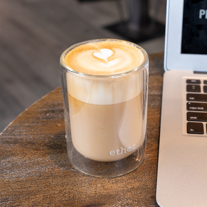 ethoz insulated glass tumblers holding coffee

