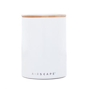 Photo of a white airscape ceramic coffee storage container.