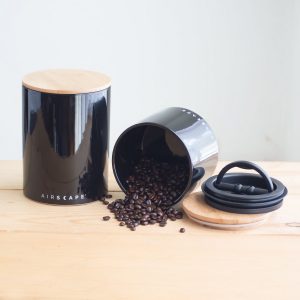 Photo of a large and small black airscape coffee canister set.