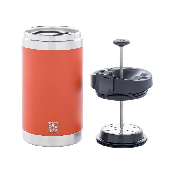 Photo of orange coffee press, it's lid removed and sitting to the right.