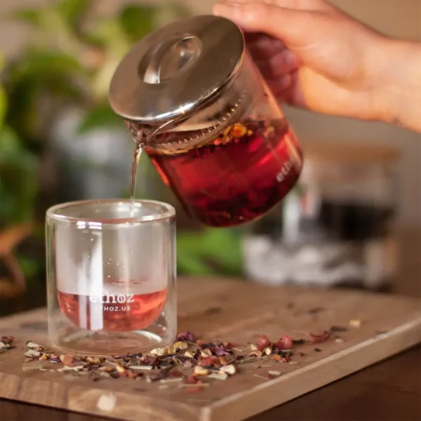 pouring tea from tea tumbler