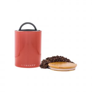 Photo of medium Red Rock color Ceramic Airscape with bamboo lid on the side with coffee beans