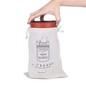 pulling airscape coffee container out of cotton refill bag