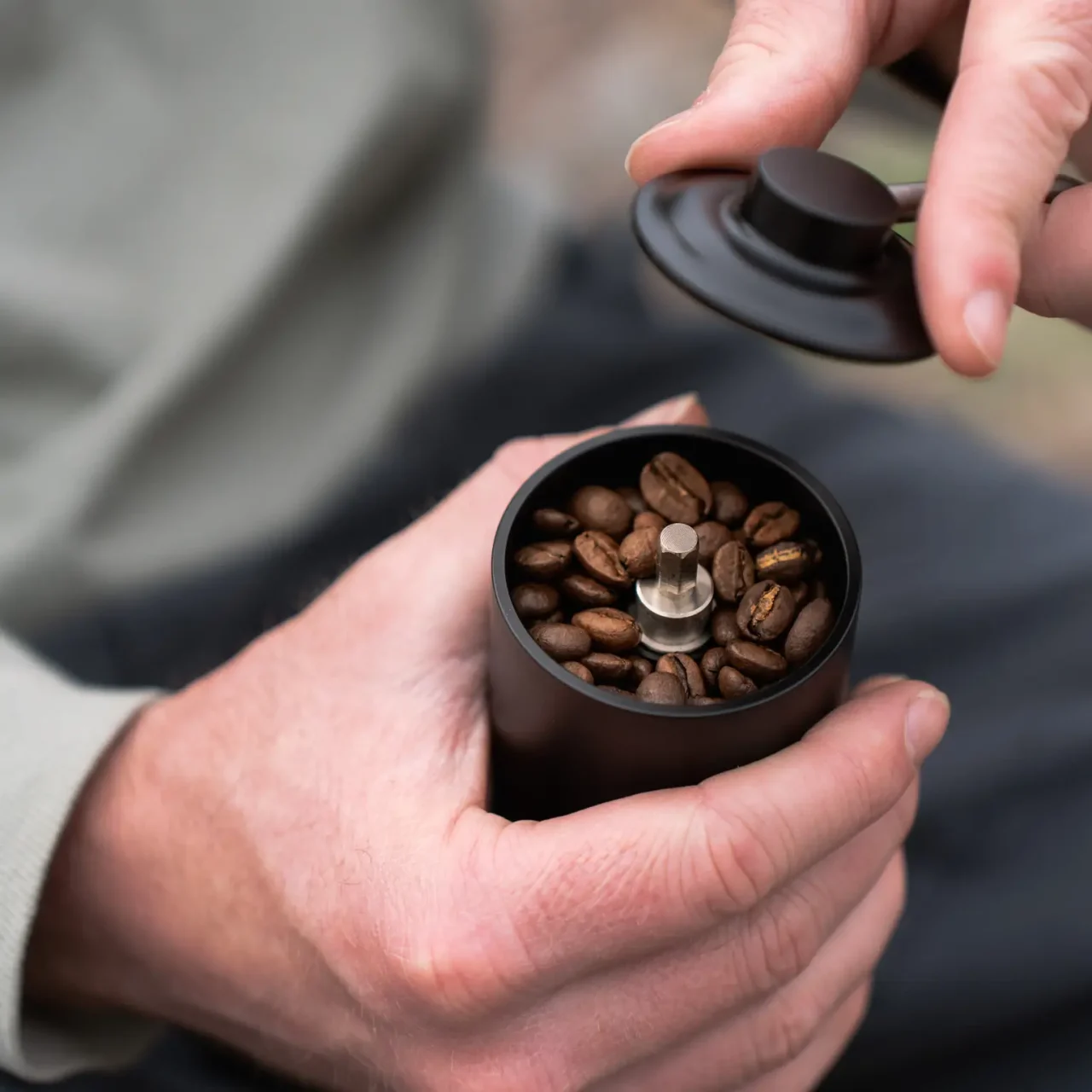 coffee inside a coffee hand grinder