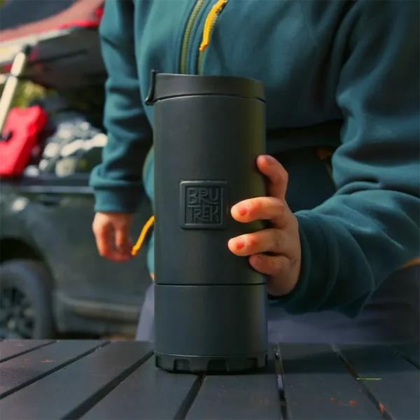 black french press on picnic table with removable bottom, easy cleanup